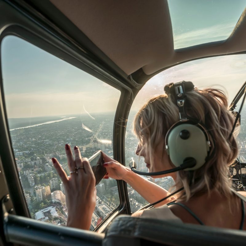 woman in helicopter tour blonde photos